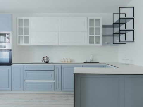 Traditional kitchen with a blue and white color scheme.